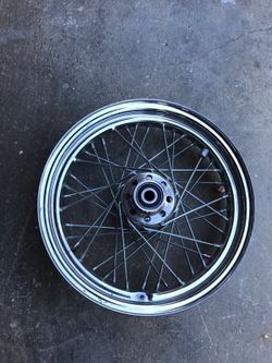 Stock size 16 Harley Davidson front rim.