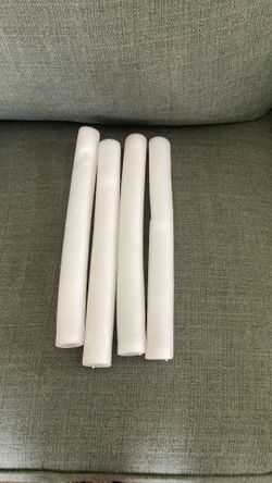 Four styrofoam light sticks