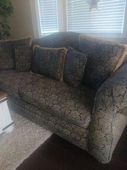 Blue Victorian sofa.