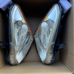 2008-2013 Nissan Rogue Headlights Left + Right 