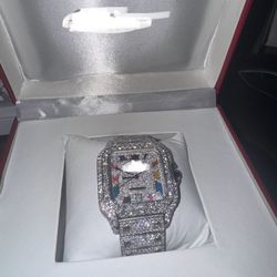 Silver and red Cartier watch