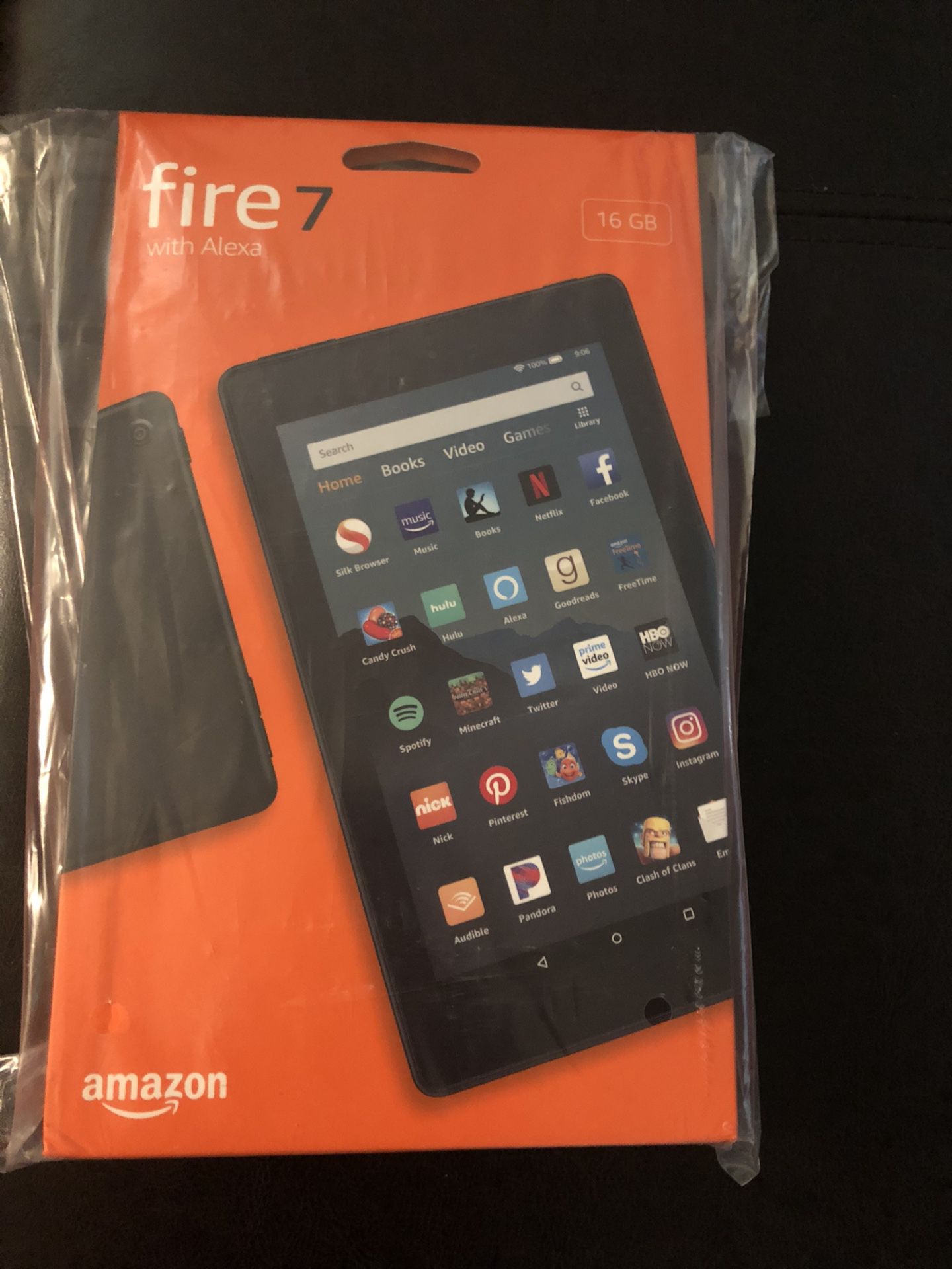 Tablet. Black fire 7 w Alexa new in box. Amazon power adapter, w built in rechargeable battery and more