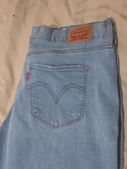 16 W Levi’s lt blue and a dark blue