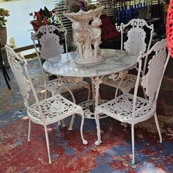 Marble Top Table And 4  Casting Airons Chairs