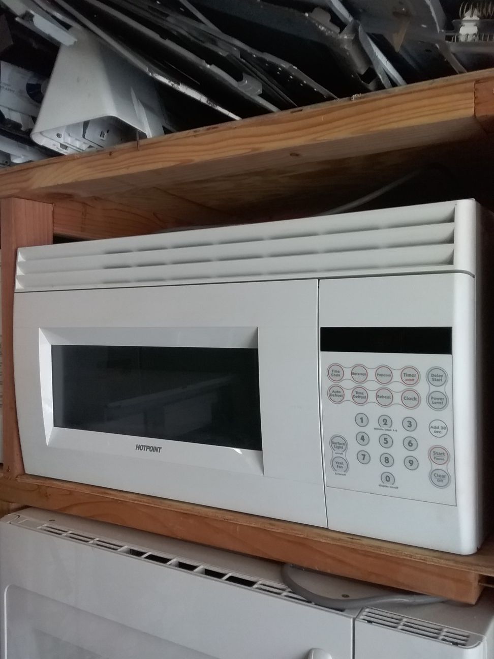 Off white ge over the range microwave bracket and screws included in good working condition