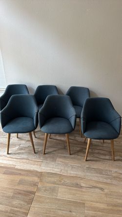 6 blue upholstered dining chairs from AllModern