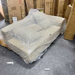 Brand new in packing , boneless sofa , soft , camel 68x40x24’’