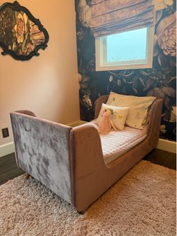 Adorable dusty rose velvet toddler bed