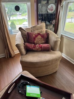 2 large, swivel chairs with ottoman