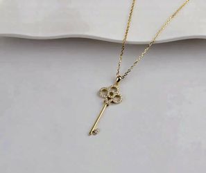 Crown key 14k yellow gold plated similar radiant diamond necklace