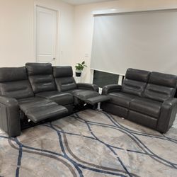 Love seat  and  dual power recliner sofa grey color leather 