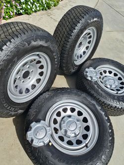 17" CHEVY WHEELS NEW TIRES BRIDGESTONE 265/70/17