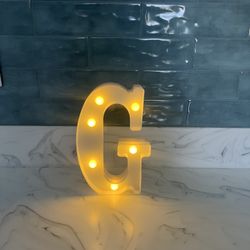 White plastic LED marquee letter 'G' approx 8”