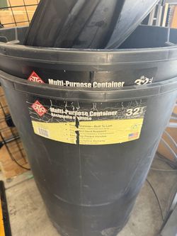 TWO 32 gal trans cans with lids