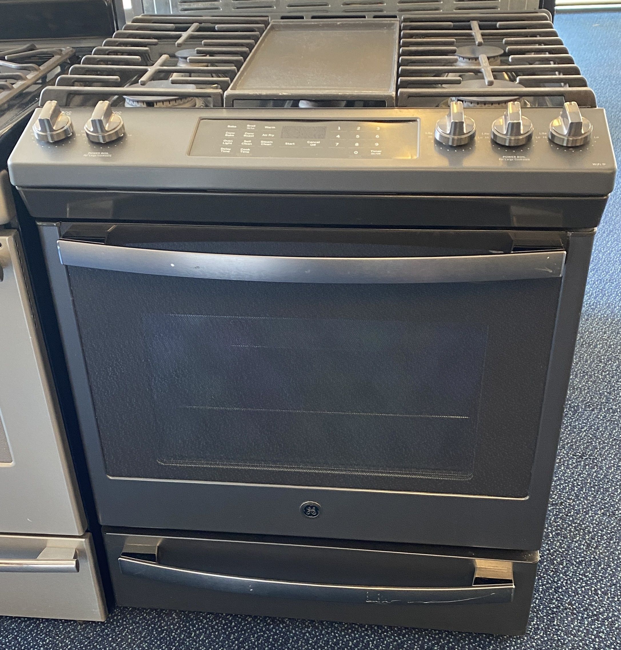 Black Stainless Steel GE Five Burner Gas Slide In Range (3...