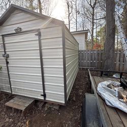 Metal shed, wooden frame