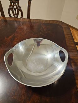 Large metal bowl with handles