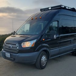 Ford Transit 350 Camper Van - Solar, Shower, Toilet, Fridge, Stove, AC, TV, Bed!