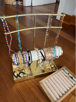 Assorted jewelry and stand