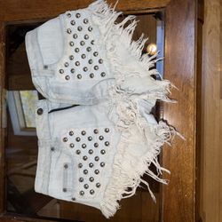 White denim shorts with silver studs 