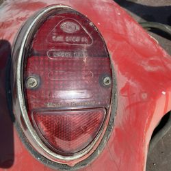 Early VW Bug OEM Tail Light. Left Side