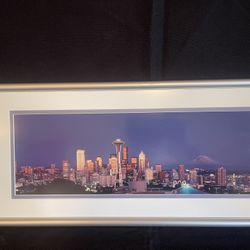 Framed photograph of the Seattle skyline at dusk