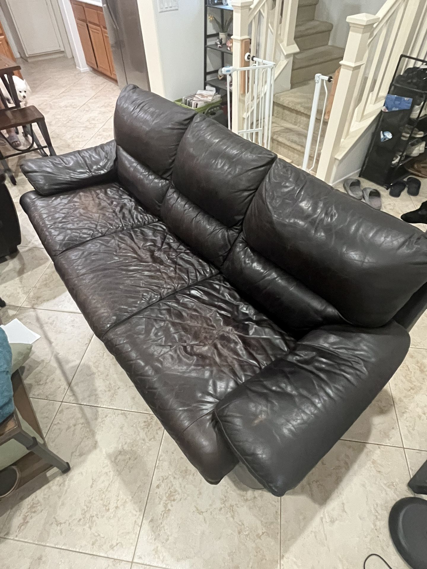 Leather couch and loveseat set