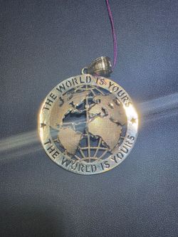 10kt YG The World Is Yours Pendant.