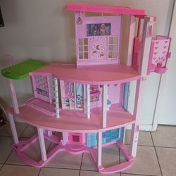 Barbie Dream House Does not include accessories... Has sounds and its manual lift works