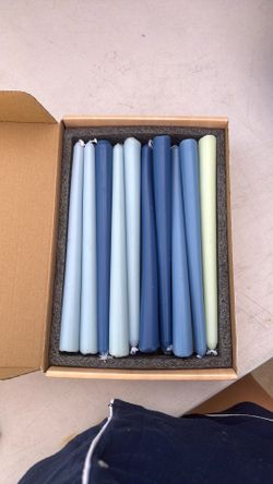 Various blue color candle sticks.