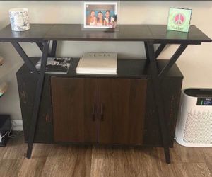 Table With Cabinet Space And Book Shelfs On The Side