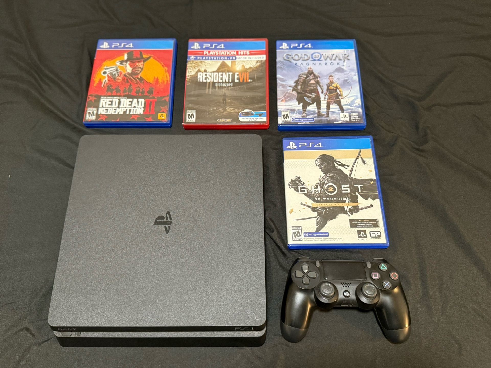 PS4 Bundle – 500GB Console + 4 Games + Accessories