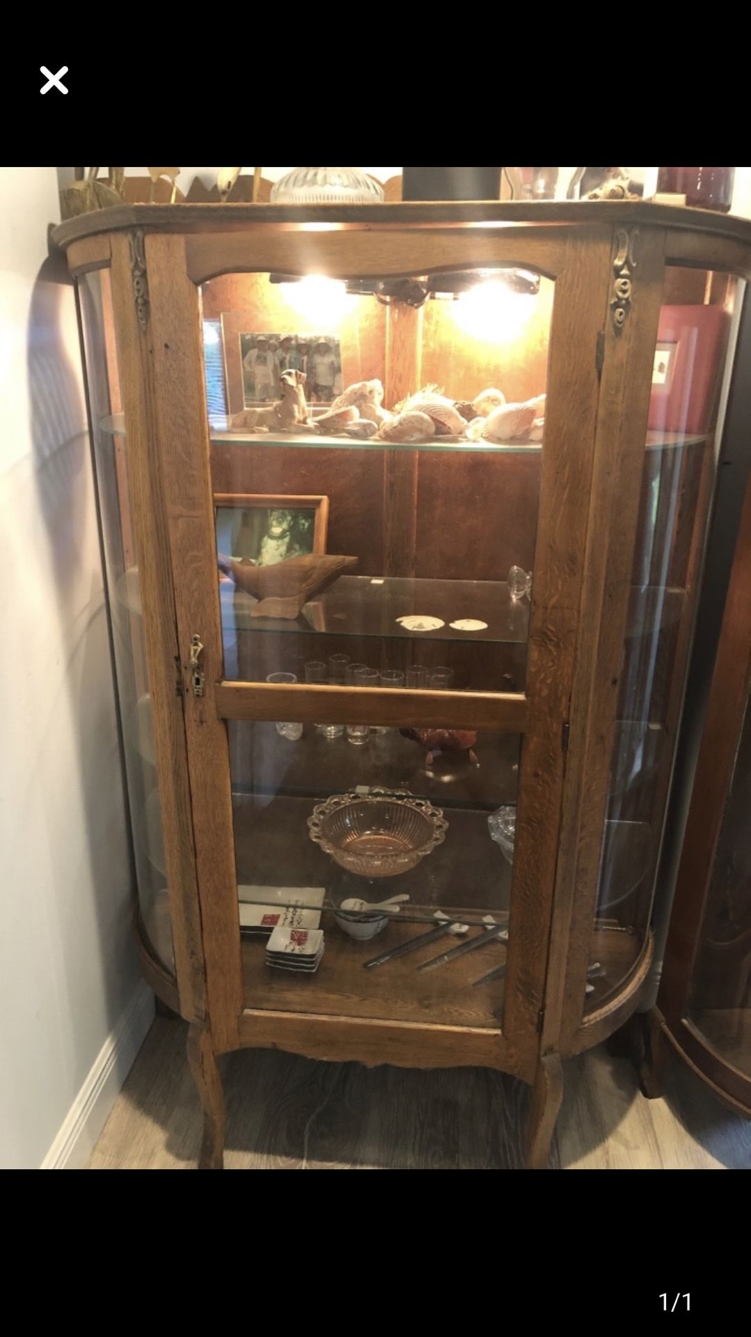 Antique curved glass china cabinet