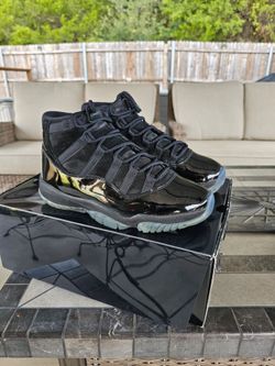 Air Jordan 11 Retro Cap and Gown Black High-Top Sneakers
