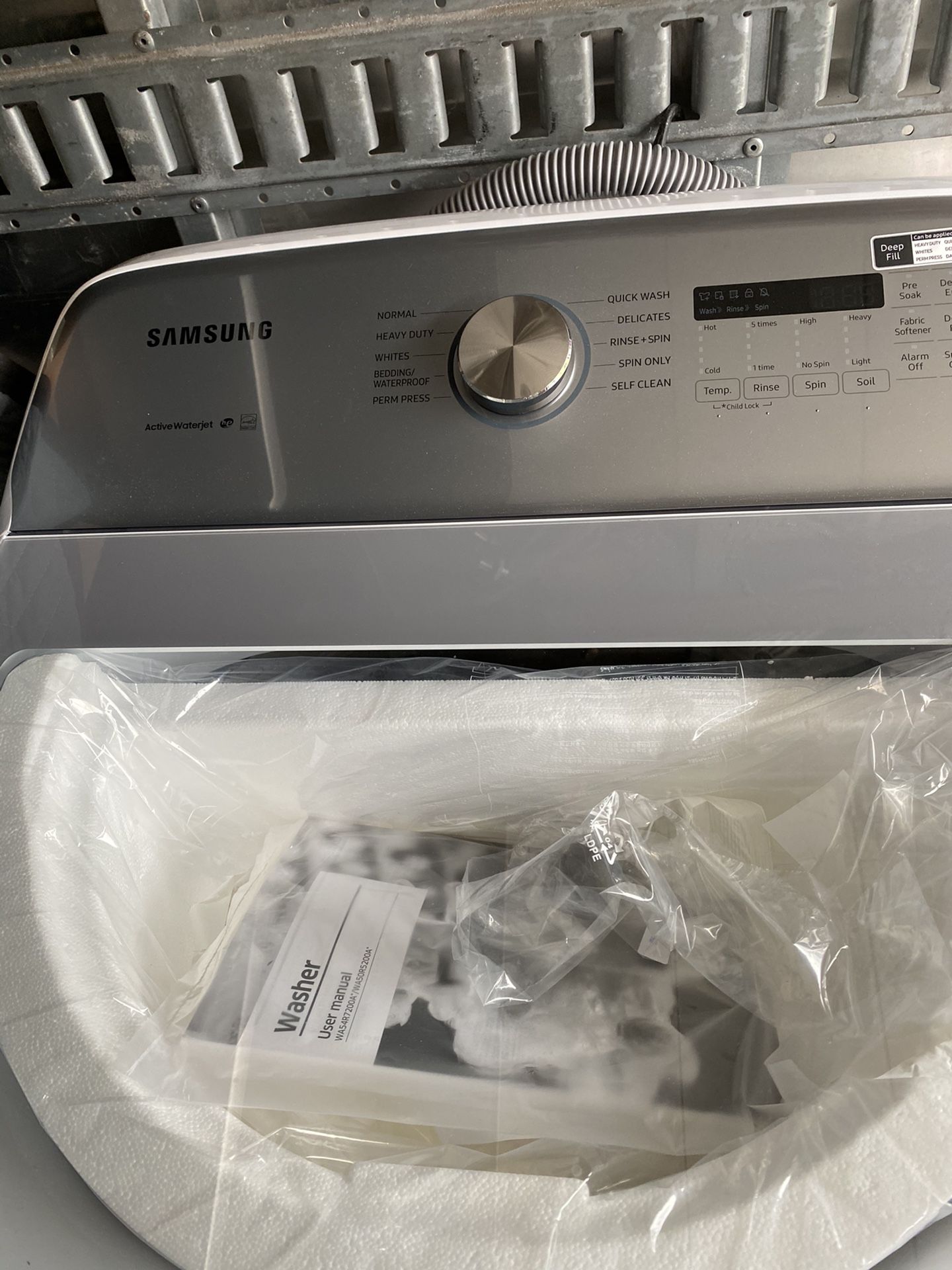 Samsung washer new directly out of plastic used as display as well as tested 350$ lowest offer I will take washer retail 695$ and up.