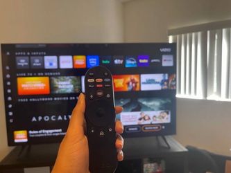 Vizio Smart TV 65” and rack and a free bar