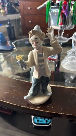 Porcelain Clown Figurine with Flowers