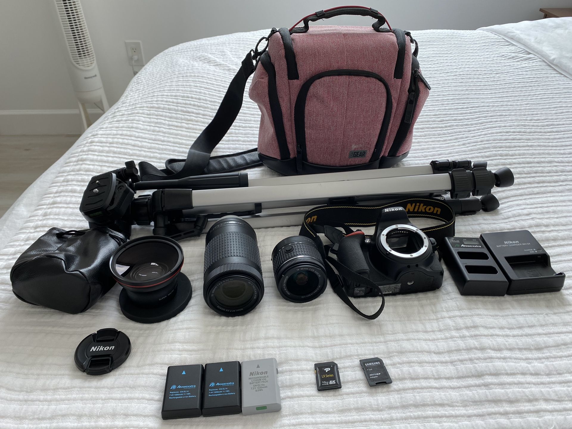 NIKON D5600 W/ 18-55nm & 70-300mm + WIDE ANGLE LENSES, 3 BATTERIES, TRIPOD, AND BAG