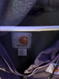 Carhartt jacket, size small (4/6), with a fleece lining, and a hood Purple