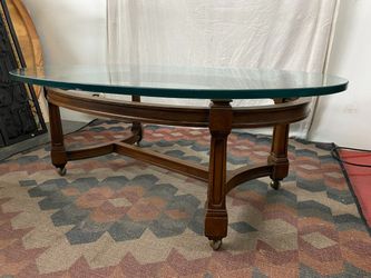 Rolling Oval Glass Top Coffee Table w/ Wood Base