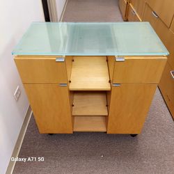 Office And  Kitchen Multi Drawer With A Trash Bin Cabinet With Glass On Top. Height 36.5 Inch. Depth 18.5. Width 36 Inch.