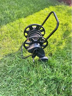 Hose reel and 50’ pocket hose