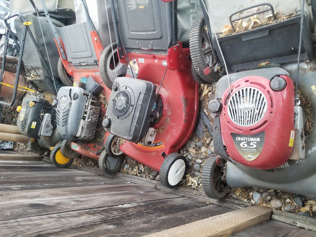 4 lawn mowers 2 craftsman 1 murray and 1 scott all need to go at once