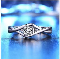 Silver heart CZ solitaire ring