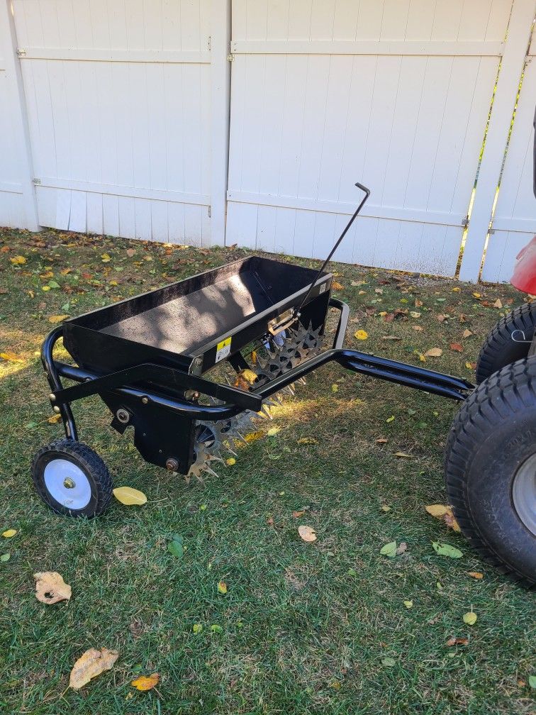 Spike aerator and drop spreader