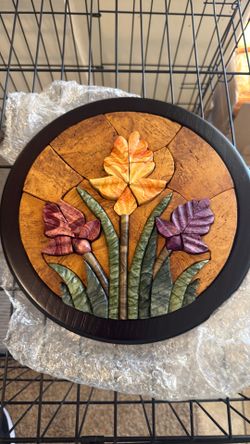 stone inlay (pietra dura) floral artwork—a decorative wall plaque
