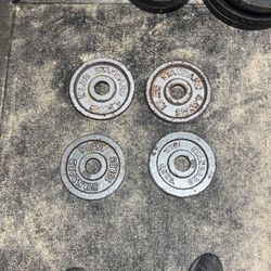 Four 2 Inch 10 Pound Olympic Plates