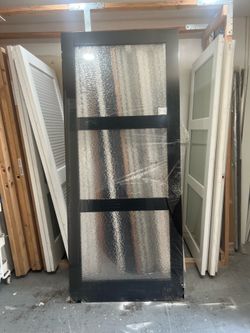 Barn door 3 panels shaker ripple glass obscure 36x84 solid core  I have (1) beautiful interior door barn doors measuring 36x84 Door slab only. I can m