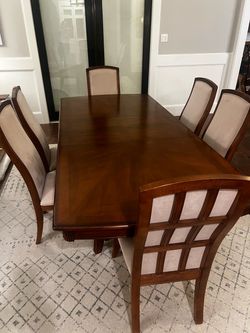 Beautiful Transitional Dining Table with 6 Upholstered Chairs