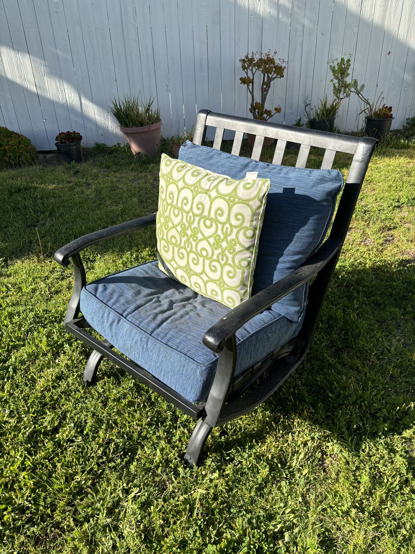 Four Metal Patio Dining Chairs with cushions and pillows